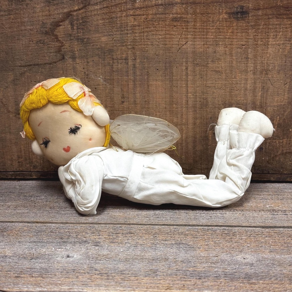 Vintage blonde-haired sleeping angel Christmas doll ornament